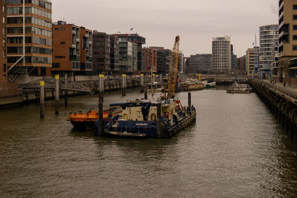 Captivating daytime view of Hamburg's HafenCity buildings and harbor.
